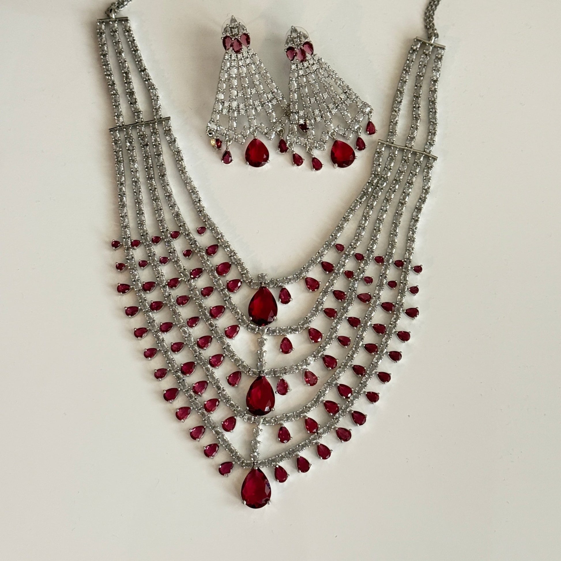 Emerald Green Multi - Layered Pearl Bridal Necklace Set with Maang Tikka & Earrings – Indian Wedding Jewelry - Vinni’s Jewelry