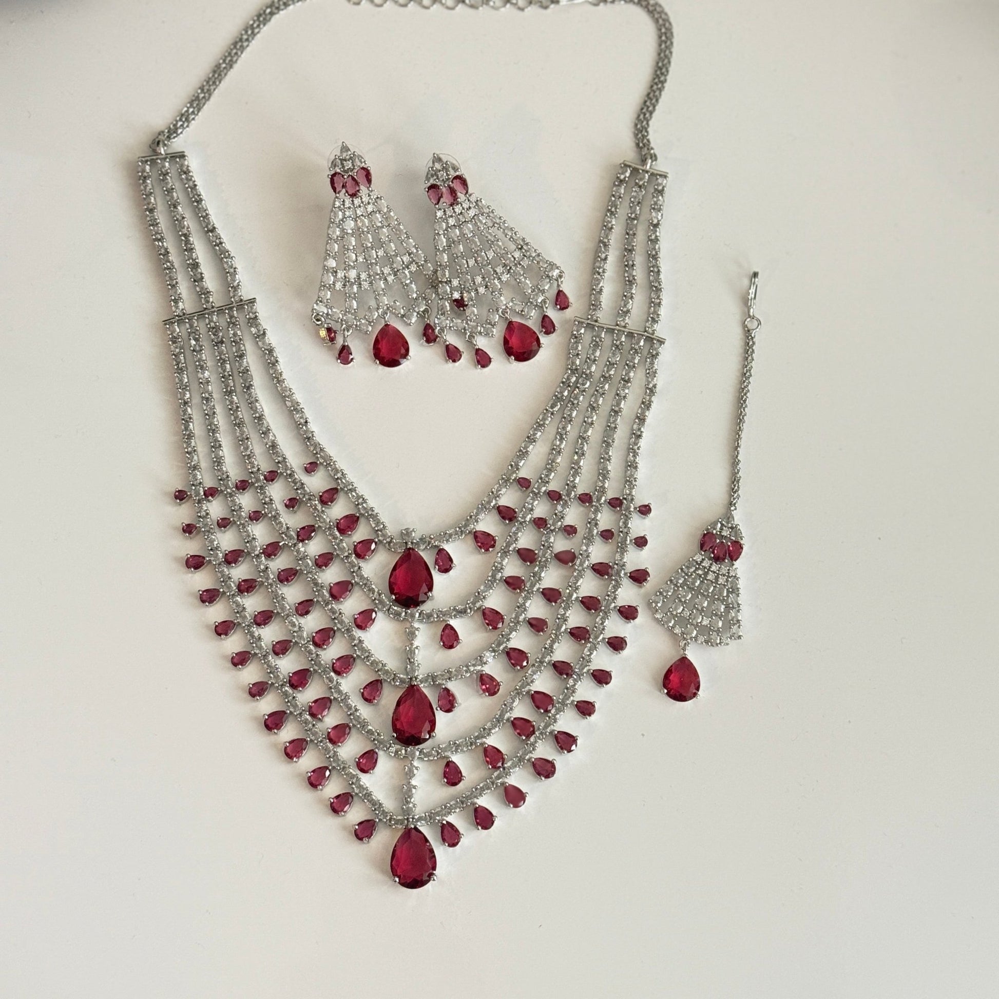 Emerald Green Multi - Layered Pearl Bridal Necklace Set with Maang Tikka & Earrings – Indian Wedding Jewelry - Vinni’s Jewelry